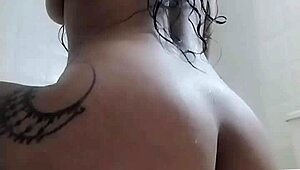 tattooed colombian fingers herself in shower squirting