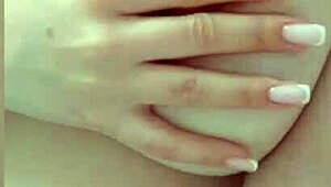 cute student teases with big bouncing breasts on bed