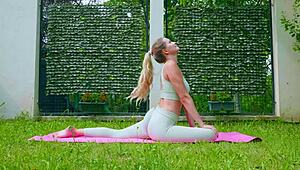 stella cardo does sexy outdoor yoga, showing off her big tits and ass