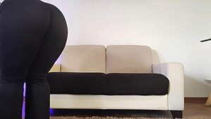 Curvy woman cleans apartment in tight leggings and pants