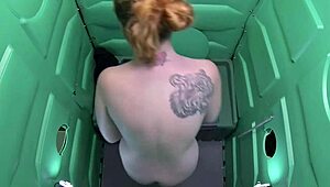 Redhead Swallows Cum at Public Porta Gloryhole Pt3