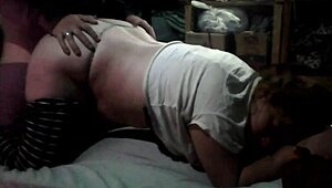 A couple enjoys a private moment in the dark.