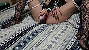 Halloween girl teases with dildo vibrator on her wet clit