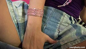 Busty young 18+ blonde Tiana masturbating her shaved pussy solo. Her big tits bounce with every eager touch in this softcore scene.