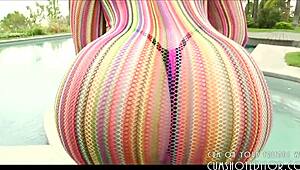 gorgeous latina strips by the pool, her big ass on display outdoors