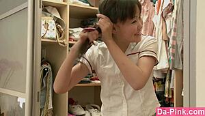 Barely legal Asian babe plays with dildo in solo fun. What's she hiding?