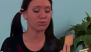 Pigtail girl licks whipped cream