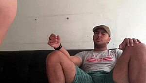 A hidden camera captures the action with a pizza delivery boy.