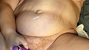 Milf experiences intense orgasm with vibrator on her wet pussy until she squirts