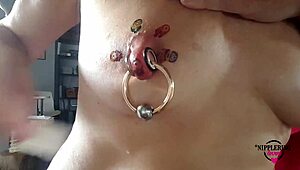 I-I can't believe this horny milf is sticking tattoos on my huge pierced nipples up close!