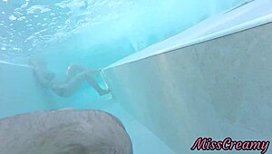 Flashing my cock at stepdaughter in public pool, she joins in