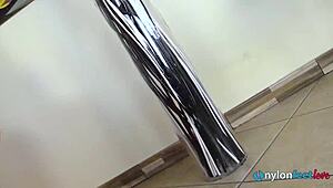 i'm showing off my tan pantyhose feet after taking off my heels, oops