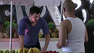 Capri Cavalli and Carla Cox engage with a street vendor in an intimate encounter