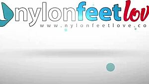 Hot brunette reveals nylon feet on street