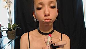 applying hot pink lipstick with drooling effect