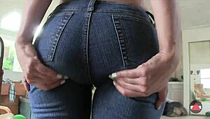 Tight Jeans Highlight Big Ass in Femdom Worship Scene