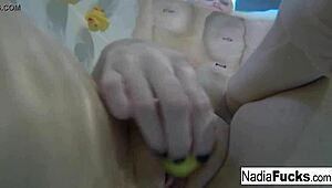Sexy blonde pornstar nadia masturbates in bath with rubber duckies