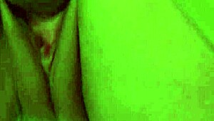 Model With Big Boobs Poses On The White Sofa