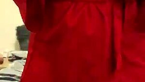 Brunette in red lingerie intensely masturbates her big tits and ass