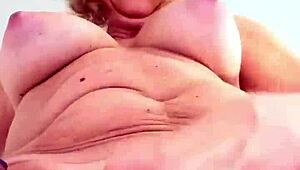 Mature lady gets naughty with big tits during work break! 😜