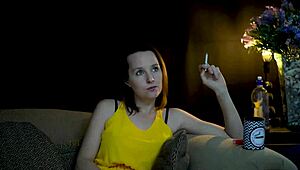 Sucking on a Cigarette While Staring at You. This Brunette Knows How to Tease.