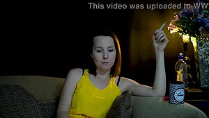 Sucking on a Cigarette While Staring at You. This Brunette Knows How to Tease.