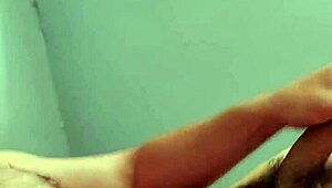 young guy fiddles with his watch and displays his rear