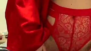 brunette feels pleasure in red lingerie touching her big tits