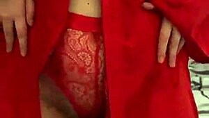 brunette feels pleasure in red lingerie touching her big tits