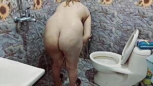 real indian stepsister caught pissing and touching herself in bathroom