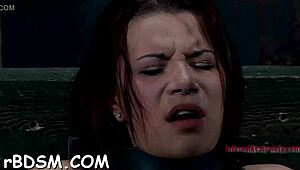 gagged and bound girl enjoys clit pleasure in sloppy bdsm session