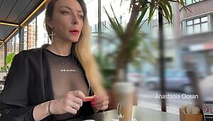 i'm flashing my titts in the cafee with glass walls so everyone outside sees me in this transparent t-shirt with no bra