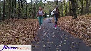 russian redhead and black british babe engage in interracial lesbian sex in fitness room