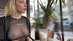 i'm flashing my titts in the cafee with glass walls so everyone outside sees me in this transparent t-shirt with no bra