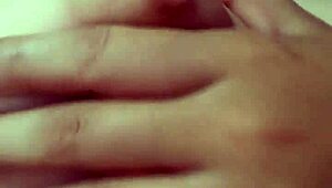 Young girl complains and screams while touching her body.