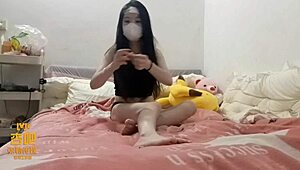 Young Asian babe rides wet pussy hard.