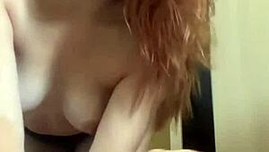 Ritafox dances seductively in sexy clothes and heels, showing her horny redhead pussy and tits