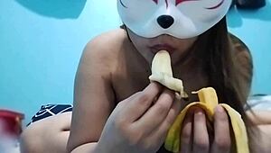 busty asian babe engages in fruit fetish with banana