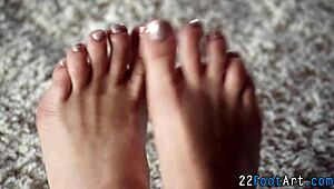 European babe gives FOOTJOB and gets JIZZED on her feet.