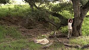 girl teases outside in woods