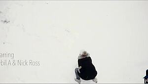 Couple Enjoys Intimate Moment After Playing in the Snow