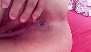 Beautiful Spanish amateur spanks her wet pussy to orgasm in solo pretty tits scene.