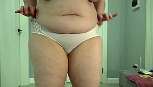 curvy milf pisses in white panties showing off dirty fetish.