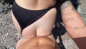 hot brunette meets stranger on public beach