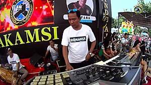 indonesian singers perform wild erotic dance on stage with eager crowd