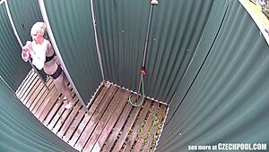 Blonde milf clueless about spy cam. Outdoor solo caught in high definition.