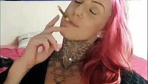 I love watching this sensual babe smoke and tease on webcam.