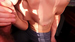 my girlfriend gives a morning handjob near the window