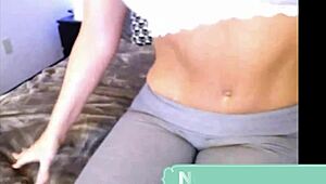 Blonde masturbates with fake tits on webcam.