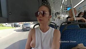 Holy crap, why's this girl flashing bare breasts on a public bus?!